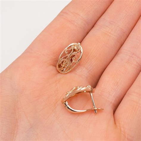 Серьги английская застежка, позолота, без камней с узорами 924232(1 ...
