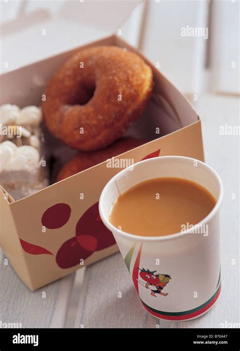 Coffee with donut Stock Photo - Alamy
