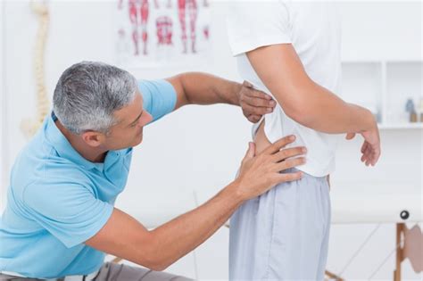 premium photo doctor examining  patient