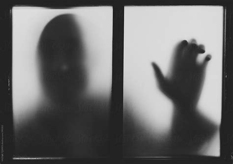 shadow   man   window  stocksy contributor victor