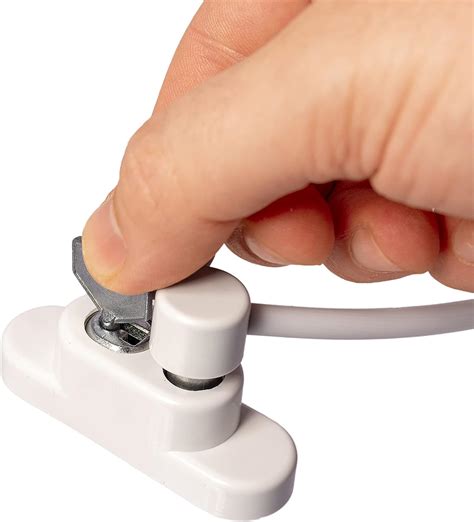 White Lockable Window Restrictor with Key & Fixing Screws. Window Lock