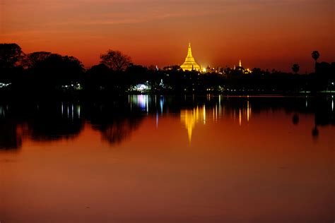 White Building Surrounded by Water and Trees during Golden Hour · Free ...