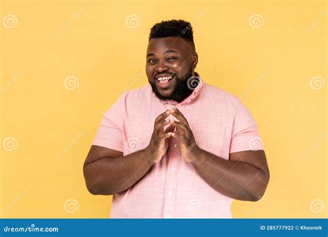 man clasping hands  planning evil tricky prank  scheming cheating