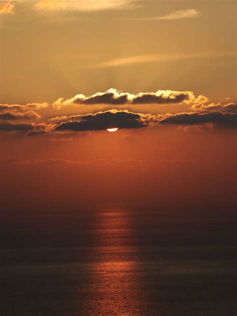 Download Amber And Gold Cloud Aesthetic Wallpaper | Wallpapers.com