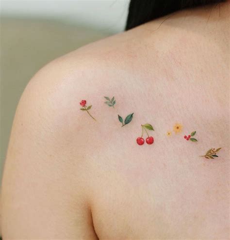Tiny Flowers Tattoo - Get an InkGet an Ink