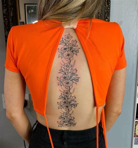 Lotus Spine Tattoo