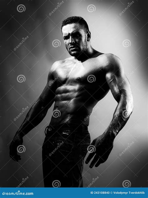 Topless Shirtless Male Model. Naked Bodybuilder on Blue Neon Light