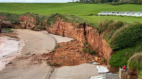 Dawlish cliff fall leads to closure of coastal footpath - BBC News