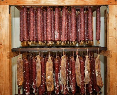 premium photo dry cured sausage  dried  racks