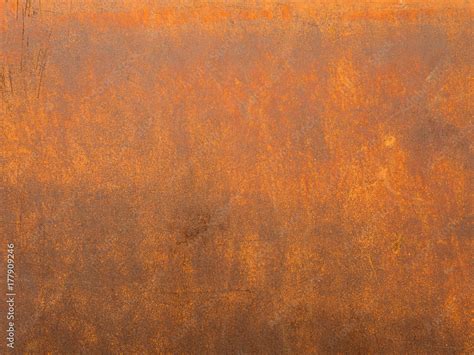 Rust surface. Close up of black rust on an old sheet of metal texture ...