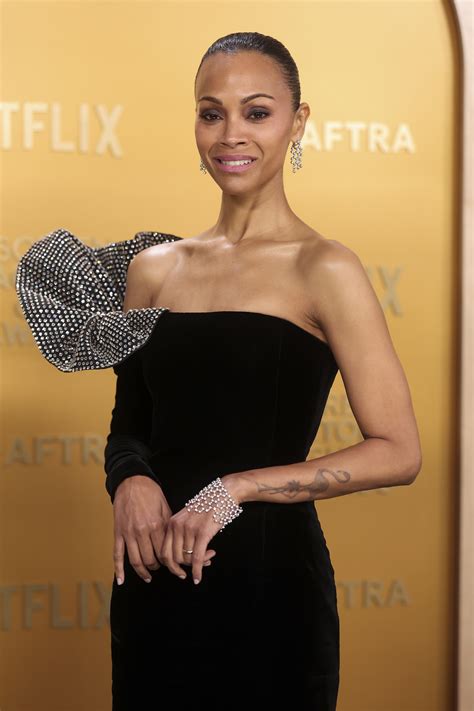 Zoe Saldaña Goes Strapless in Saint Laurent Dress With Dramatic Ruffle