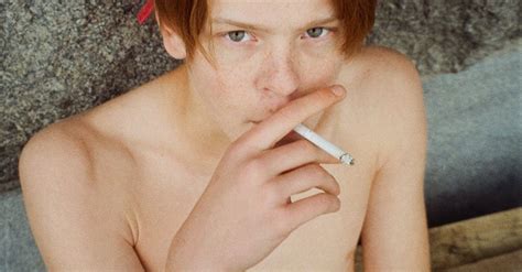 Young Man Smoking a Cigarette · Free Stock Photo