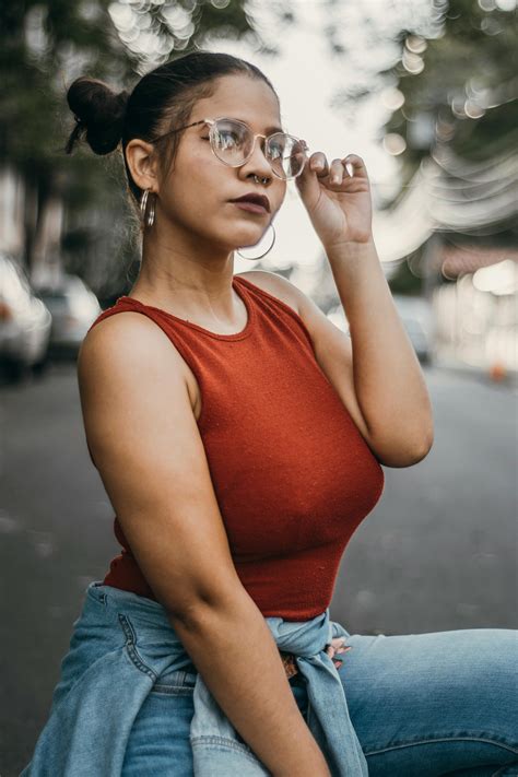 Woman Wearing Red Tank Top · Free Stock Photo