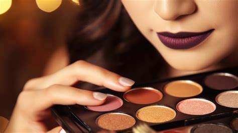 Premium Photo | Young woman wearing heavy makeup holds her color palette