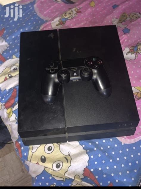 Ps4 Fat For Sale With Top 8 Games 100k - Gaming - Nigeria