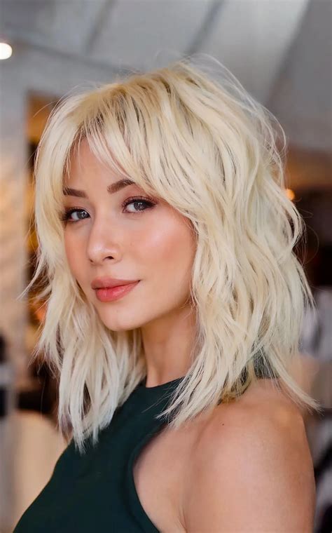 Low-maintenance shaggy haircut with bangs saves time every morning 4