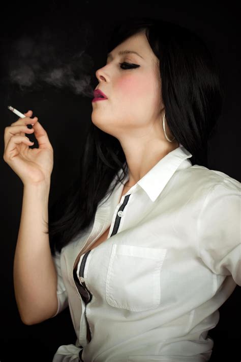 Young Beautiful Woman Smoke Cigarette 3109717 Stock Photo at Vecteezy