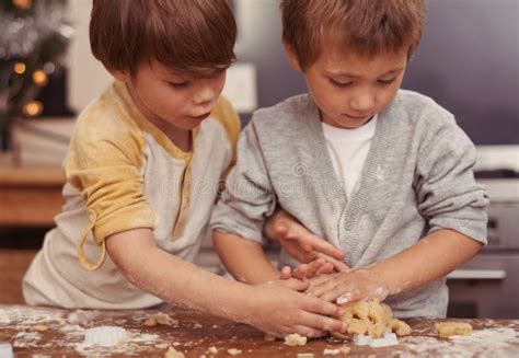 No, Youre Doing it Wrong. Two Young Brothers Baking in the Kitchen ...