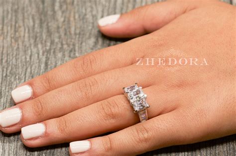 3 stone emerald cut ring 9