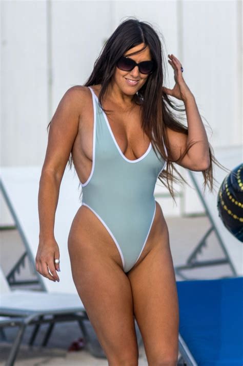 CLAUDIA ROMANI in Swimsuit on the Beach in Miami 12/31/2017 – HawtCelebs