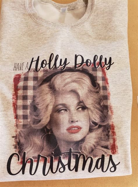 Pin by Lisa Bandermann on Dolly | T shirts for women, Holly dolly, Women