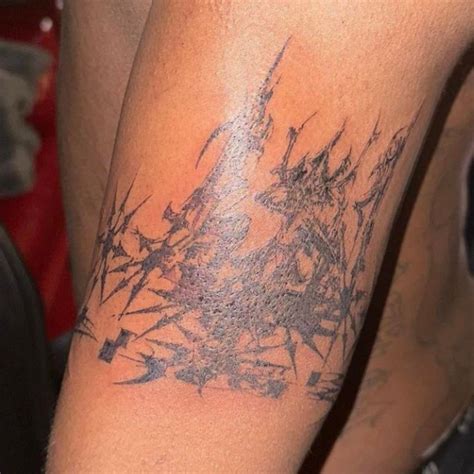 What Playboi Cartis Tattoos Reveal About His Identity Creativity And Cultural Rebellion