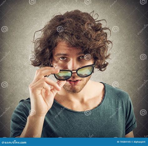 Look over sunglasses stock image. Image of dude, serious - 70584145