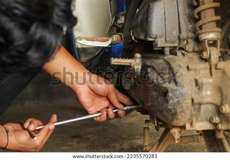 Mechanic Fixing Motorcycle Engine Motorcycle Repair Stock Photo ...