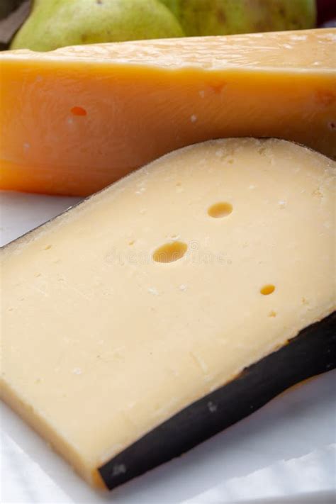 Pieces of Aged Original Dutch Hard Cheeses Close Up Stock Photo - Image ...