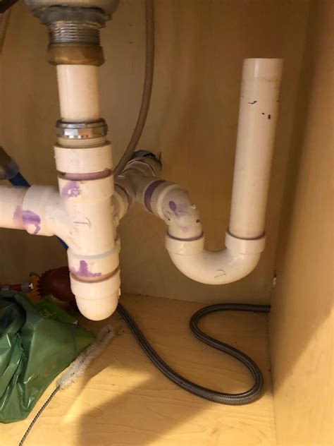 Looking for advice. My kitchen sink drain is setup as shown and I found