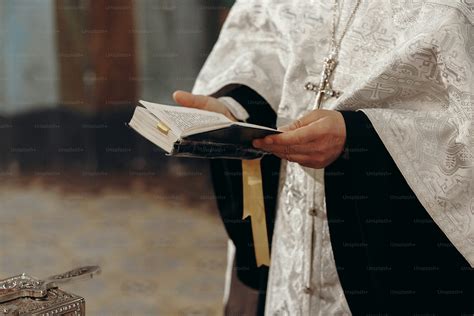 Priest reading holy bible in christian church during orthodox wedding