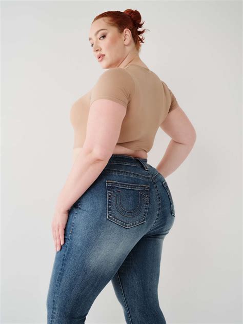 JENNIE MID RISE CURVY SKINNY JEAN