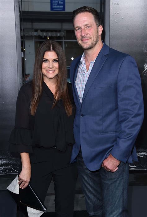 Download Tiffani Thiessen Posing Elegantly Wallpaper | Wallpapers.com