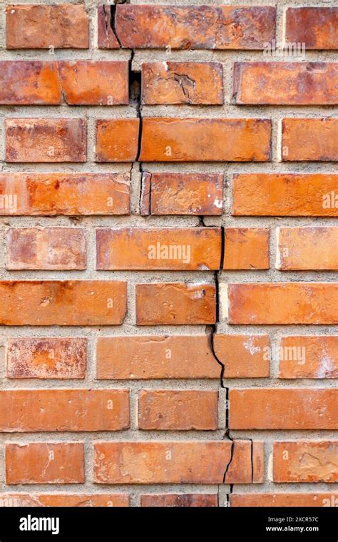 4 Ways To Brick Your Holes: Fixing A Cracked Brick Wall