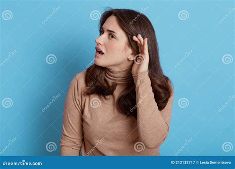 I Can`t Hear You! Confused Woman Keeping Hand Near Ear To Listen Better ...