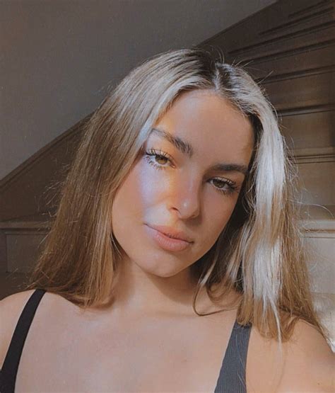 Download Addison Rae Rainbow Rays Wallpaper | Wallpapers.com