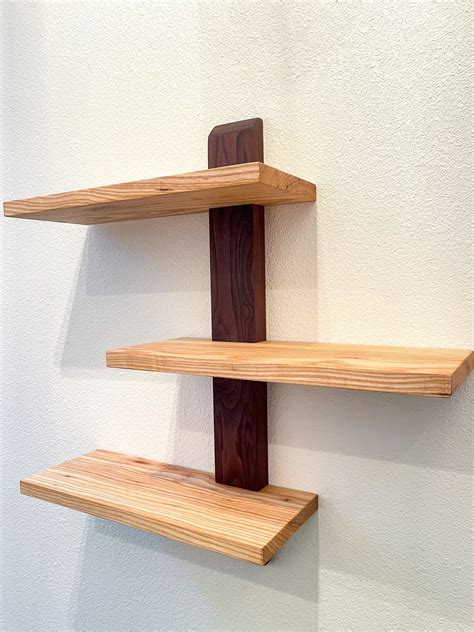 staggered shelves  tier shelf ideas