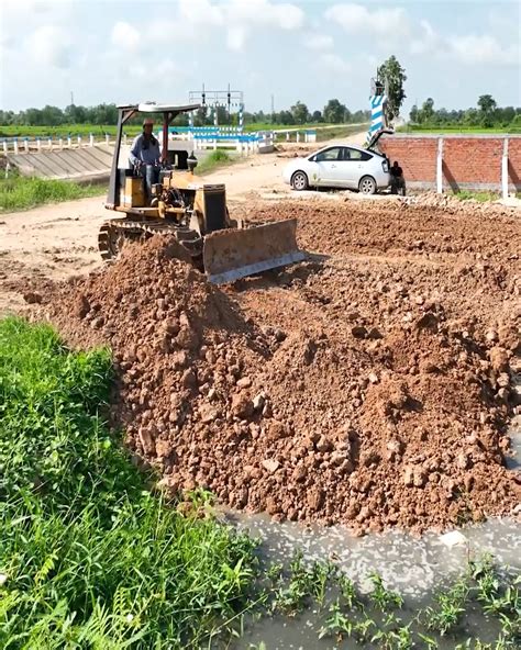 New Road Construction Project With Bulldozer Komatsu D20P Pushing