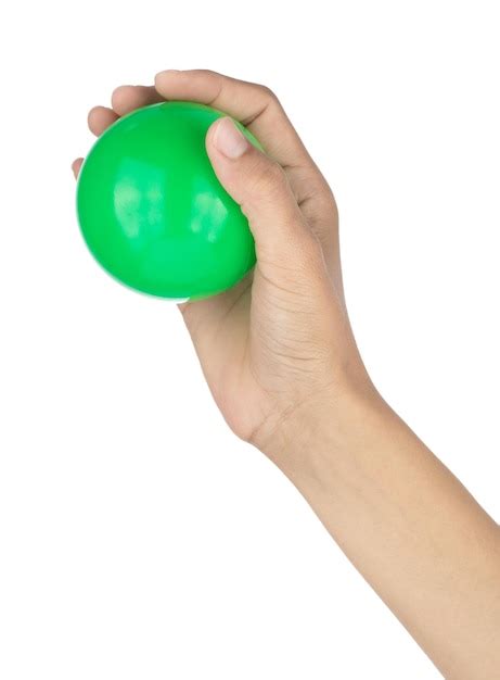 premium photo hand holding plastic ball toy isolated   white