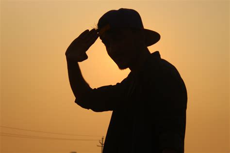 wallpaper silhouette  man wearing fitted cap peakpx