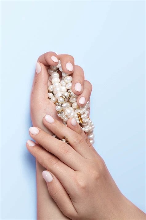 Manicure and beauty concept. Woman showing her beautiful manicure ...