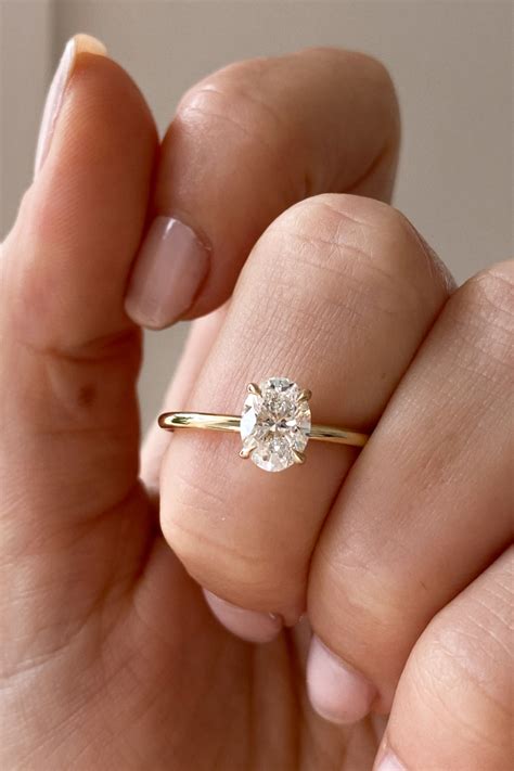 unique oval solitaire engagement ring artofit