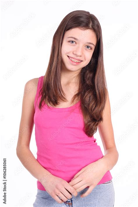Beautiful young teen girl with brackets on teeth in white Stock Photo ...