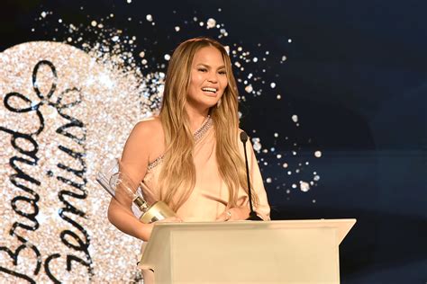 Chrissy Teigen Mourns Her Breast Implants Post-Surgery With "RIP" Boob Cake