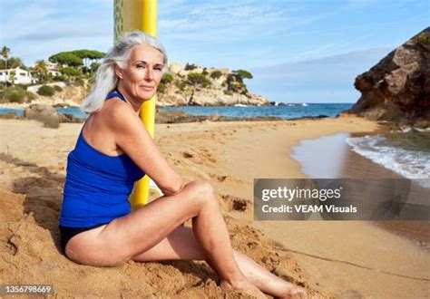 Beautiful Mature Woman Beach Photos and Premium High Res Pictures