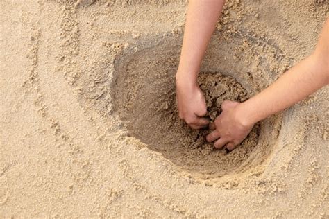 Digging Sand Hole Royalty-Free Images, Stock Photos & Pictures ...