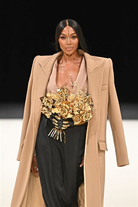 Naomi Campbell Closes Out Paris Fashion Week in Artful Gold Headpiece