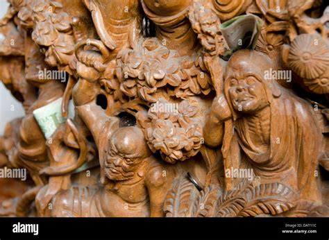 China, Shanghai, Jade Buddha Temple. Ancient wood carving Stock Photo ...