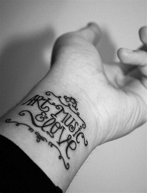 Art, music, love quote tattoo with ornaments on arm - Tattooimages.biz