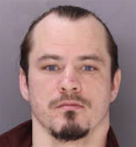 armed robber  killed husband wounded wife  sister  law